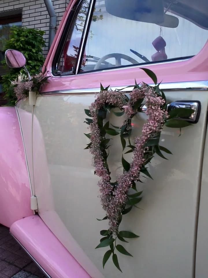 Detail des rosa VW Käfers Dolly